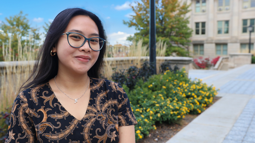 student posing for a photo and smiling
